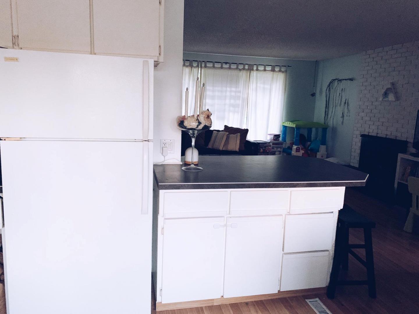 Open Living & Kitchen — before